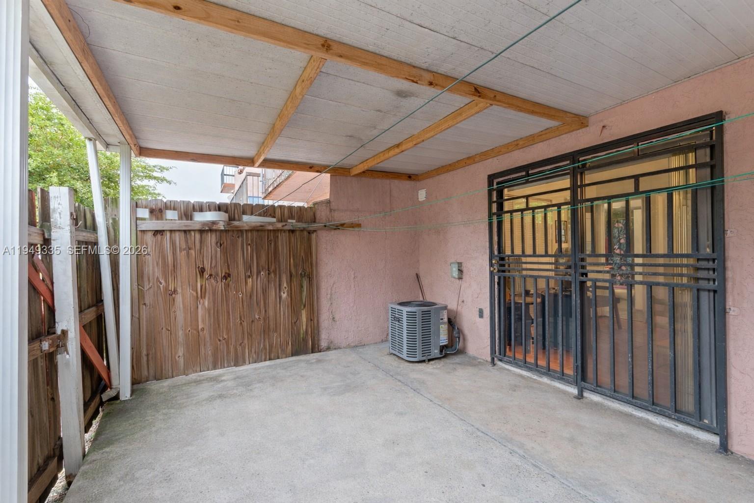 2178 West 60th Street, Unit 18111 Hialeah, FL 33016 - Photo 13 of 17 a view of a garage