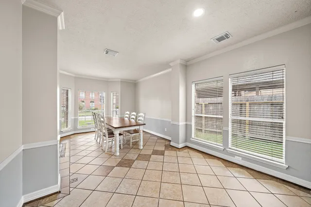 a view of a livingroom with furniture and a window