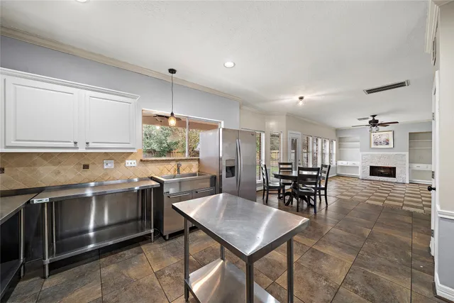 a view of a house with a yard and sitting area
