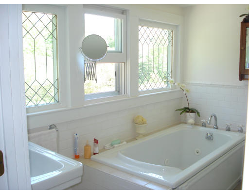240 First Parish Road Scituate, MA 02066 - Photo 20 of 20 a bathroom with a tub sink and window