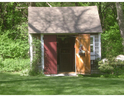 240 First Parish Road Scituate, MA 02066 - Photo 8 of 20 a view of a wooden door with a yard