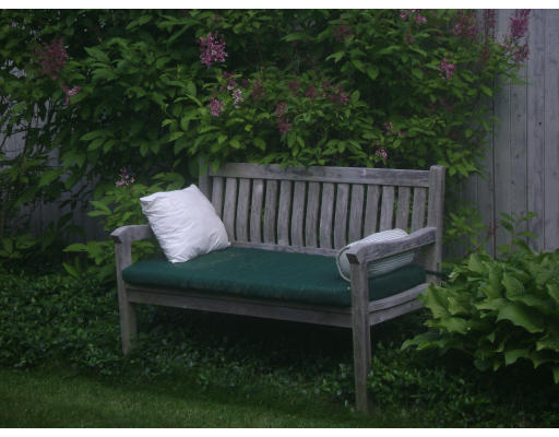 240 First Parish Road Scituate, MA 02066 - Photo 9 of 20 a view of a wooden bench in back yard
