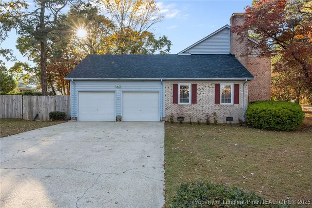 a view of a house with a street