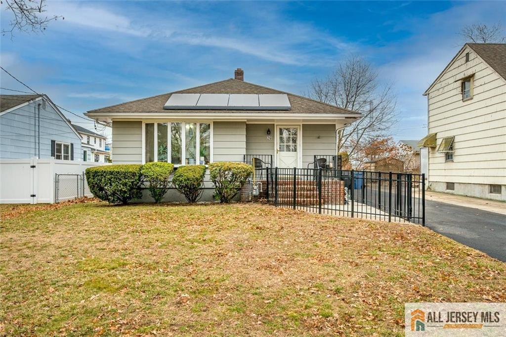 26 Goodwill Place Metuchen, NJ 08840 - Photo 2 of 34 a front view of a house with glass doors