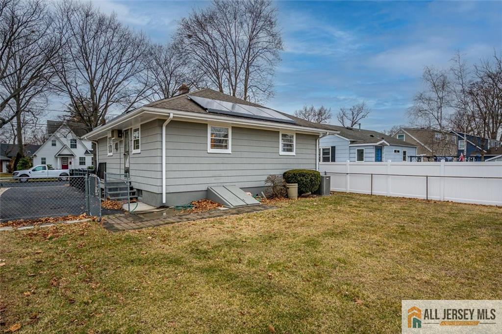 26 Goodwill Place Metuchen, NJ 08840 - Photo 29 of 34 a house with trees in front of it