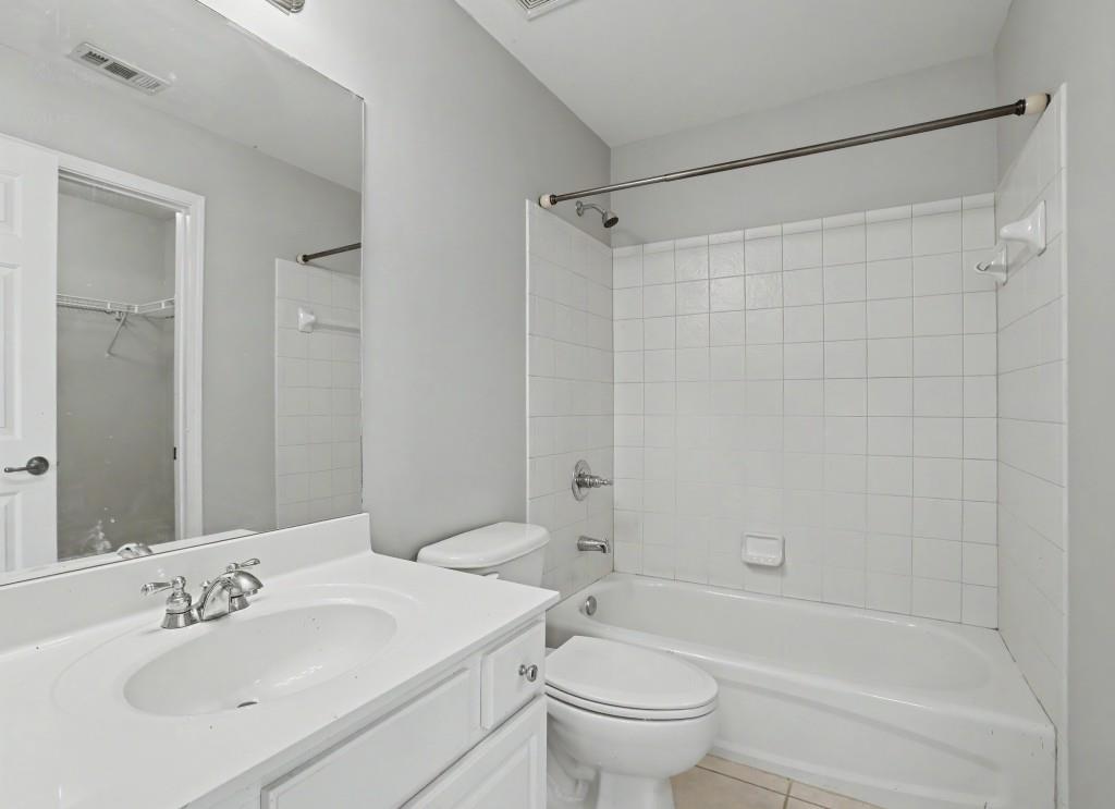 2123 Floral Ridge Drive Dacula, GA 30019 - Photo 44 of 56 a bathroom with a sink toilet and shower