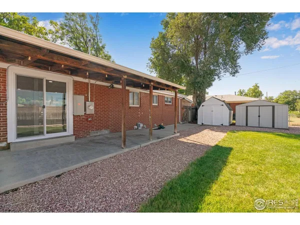 a house view with a backyard space