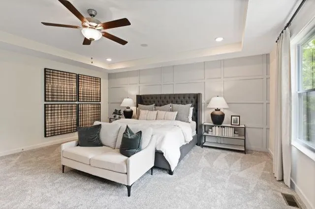 a bathroom with a shower sink and mirror