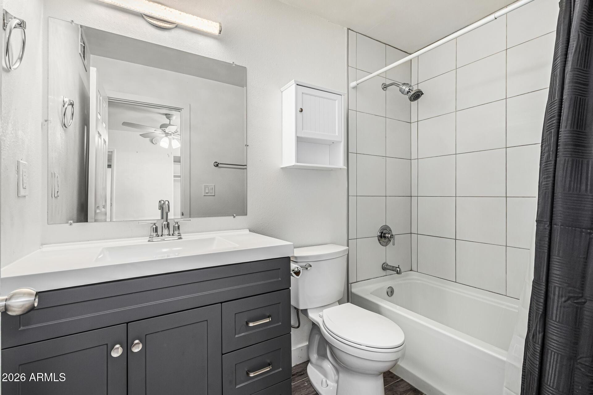 1213 East Riviera Drive Tempe, AZ 85282 - Photo 17 of 28 a bathroom with a sink a toilet and shower