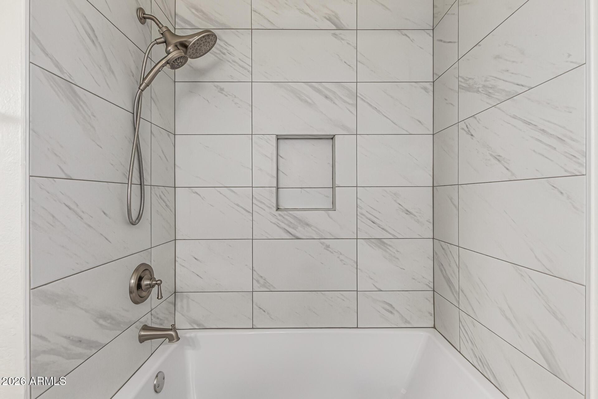1213 East Riviera Drive Tempe, AZ 85282 - Photo 23 of 28 a bathroom with a bathtub