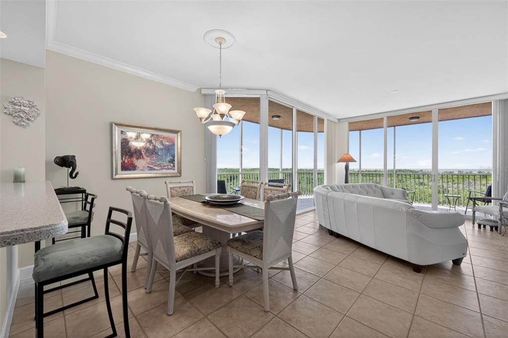 3191 Matecumbe Key Road, Unit 202 Punta Gorda, FL 33955 - Photo 3 of 37 a living room with furniture and a table