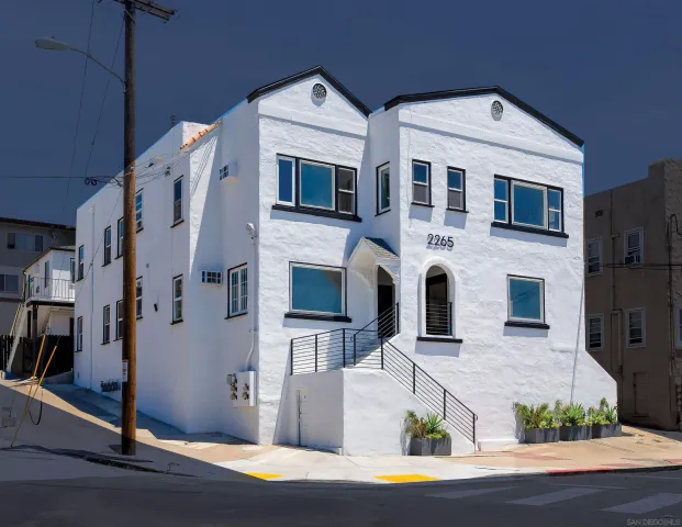 a view of a building with a street