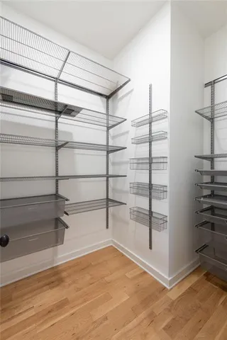 a view of a room with racks on the wall