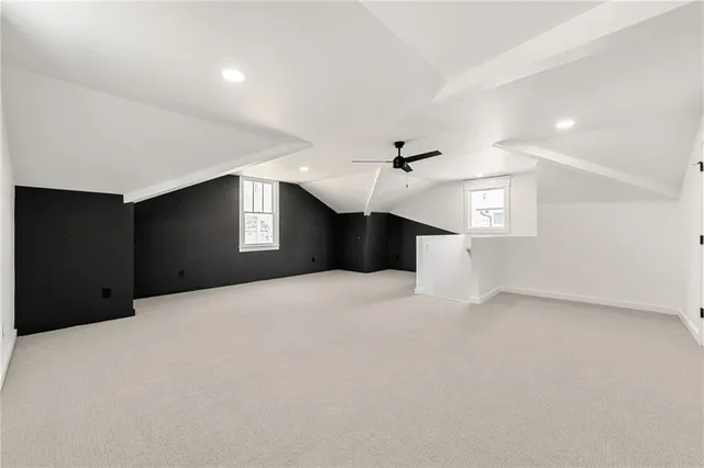 a big room with closet and windows