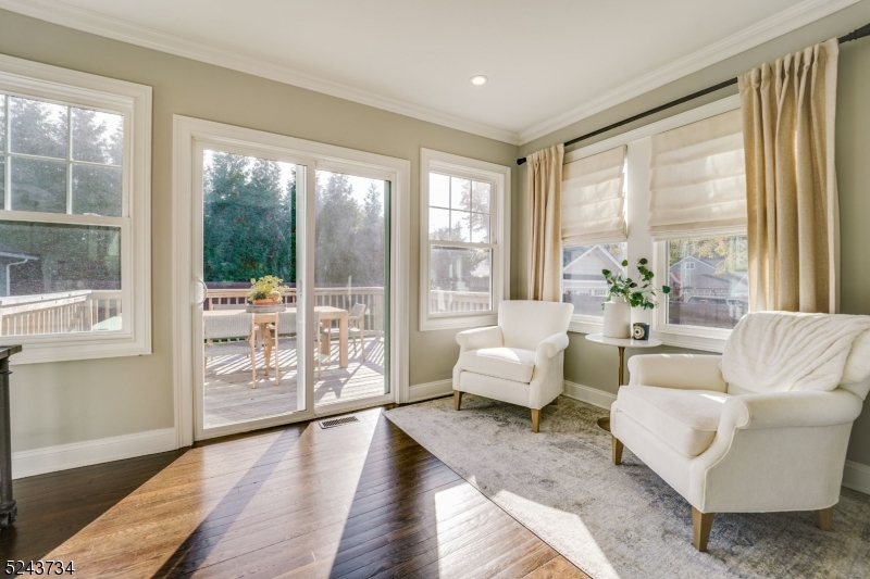 2 Loantaka Way Madison, NJ 07940 - Photo 16 of 50 a living room with furniture and a large window with outer view