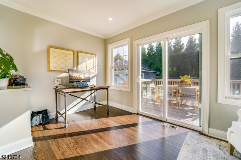 2 Loantaka Way Madison, NJ 07940 - Photo 18 of 50 a living room with furniture and a gate