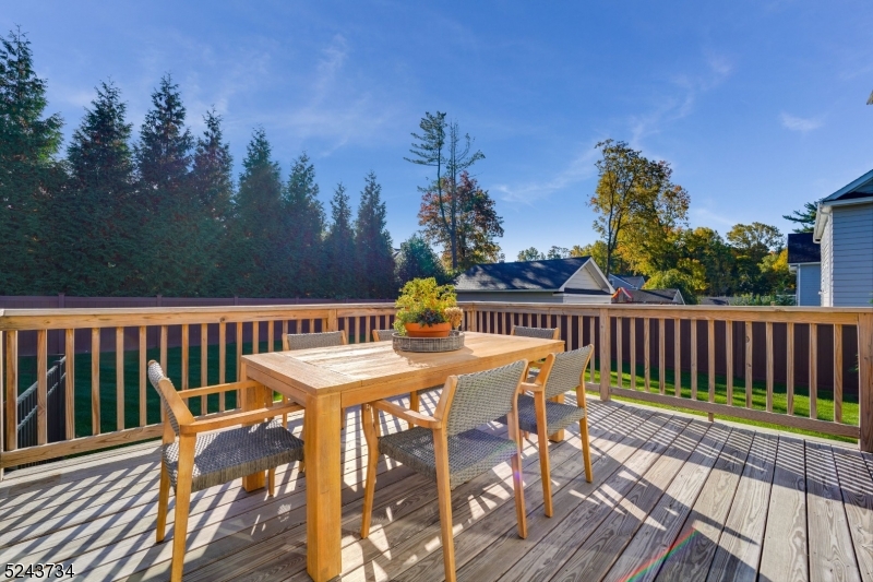 2 Loantaka Way Madison, NJ 07940 - Photo 21 of 50 a view of a deck with furniture and a yard