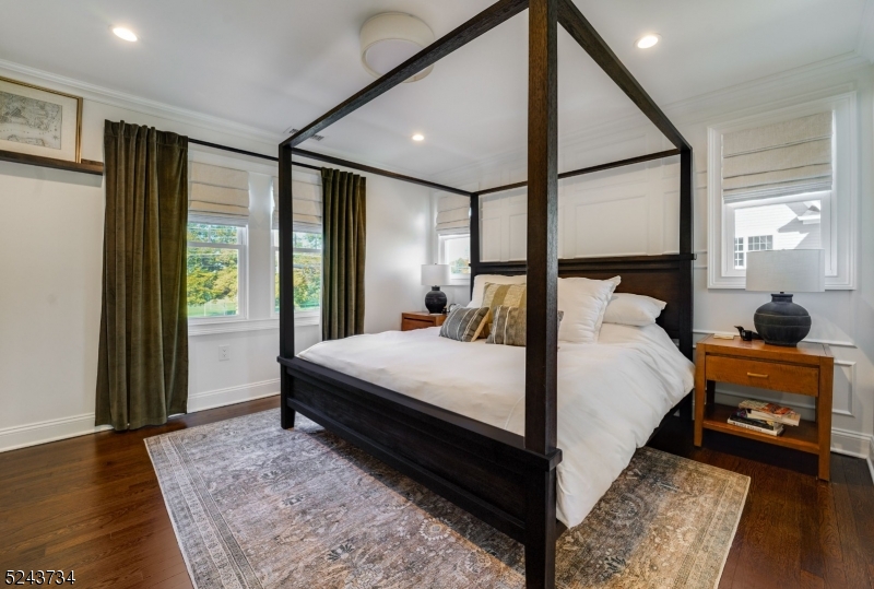 2 Loantaka Way Madison, NJ 07940 - Photo 23 of 50 a bed room with a bed and a mirror