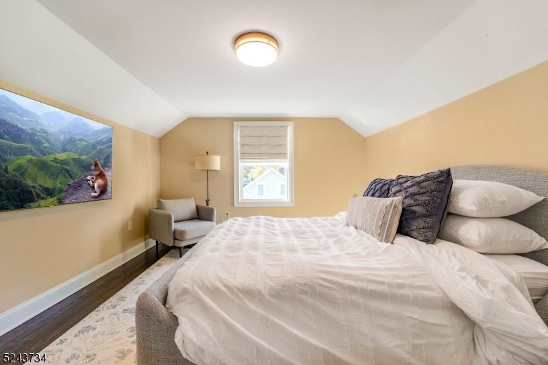 2 Loantaka Way Madison, NJ 07940 - Photo 36 of 50 a bedroom with a bed and a window