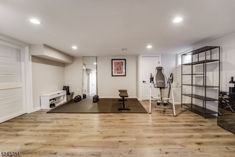 2 Loantaka Way Madison, NJ 07940 - Photo 40 of 50 a room with furniture and a wooden floor