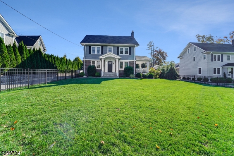 2 Loantaka Way Madison, NJ 07940 - Photo 47 of 50 a view of a house with a big yard and large trees