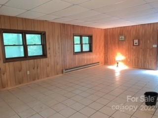 154 Meadows Road Canton, NC 28716 - Photo 26 of 31 an empty room with windows