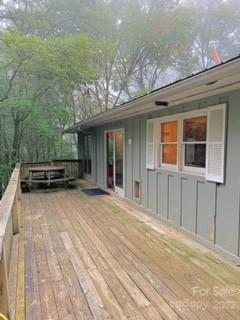 154 Meadows Road Canton, NC 28716 - Photo 6 of 31 a view of a house with a backyard