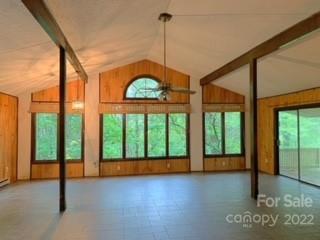 154 Meadows Road Canton, NC 28716 - Photo 8 of 31 a view of an empty room with windows