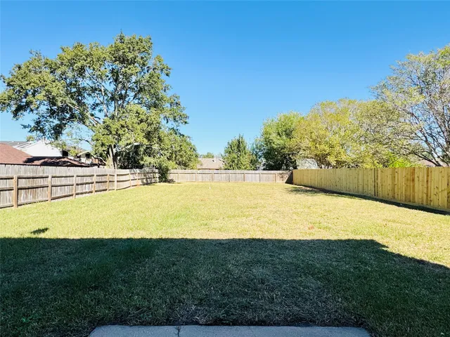 a view of an outdoor space and swimming pool
