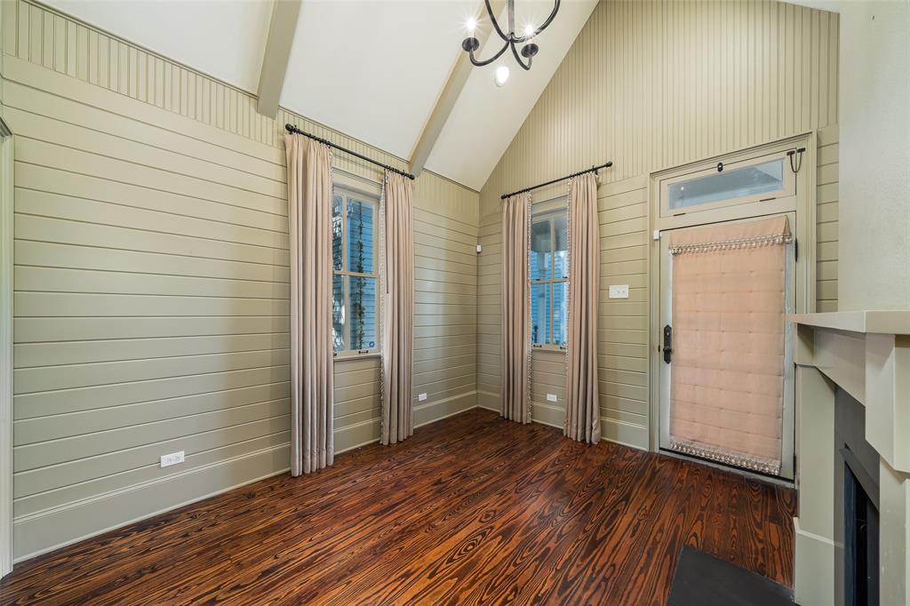 2315 Routh Street Dallas, TX 75201 - Photo 30 of 38 a view of an empty room with wooden floor and a window