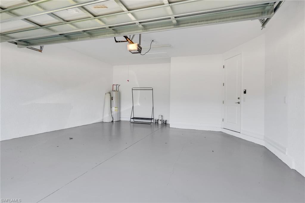 7540 Carnegie Way Naples, FL 34119 - Photo 21 of 40 a view of a room with an empty space