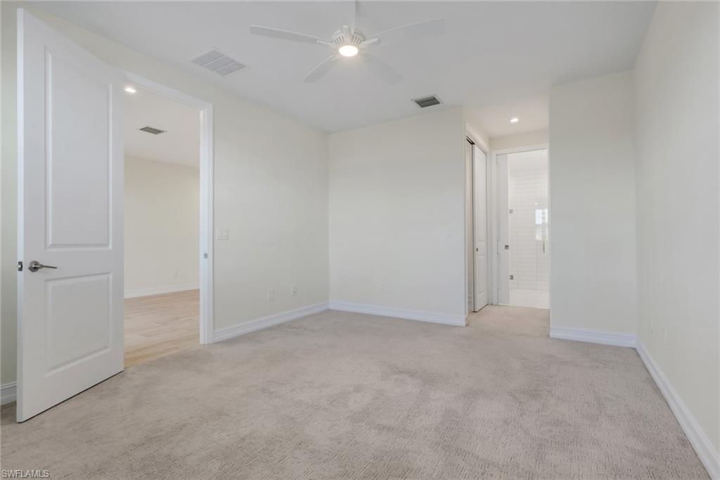 7540 Carnegie Way Naples, FL 34119 - Photo 24 of 40 a view of an empty room