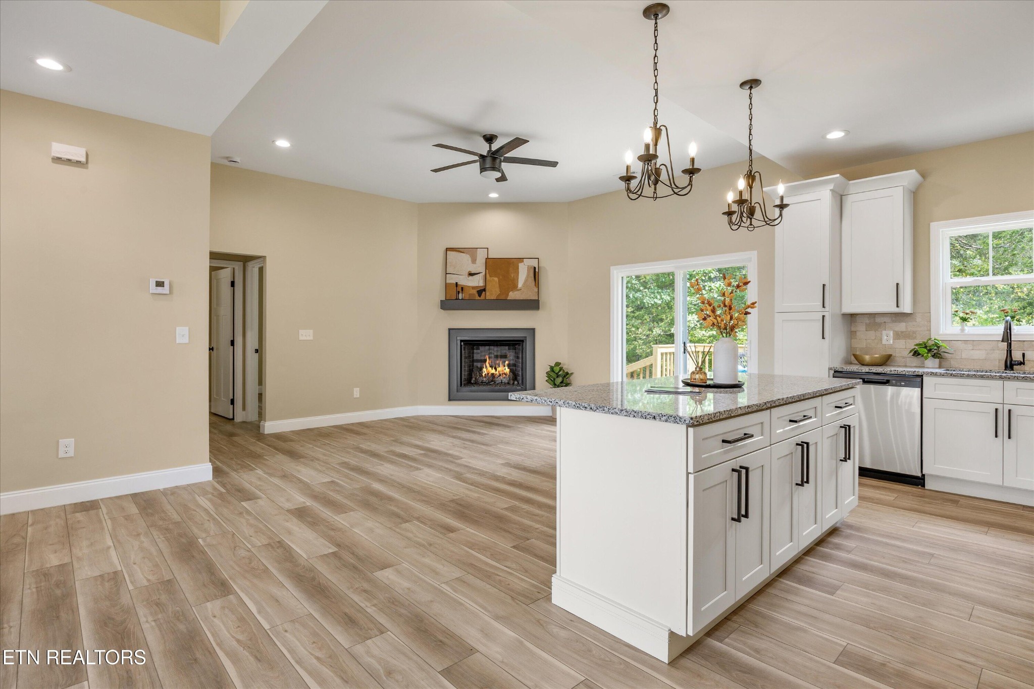210 Daniel Morris Point Clinton, TN 37716 - Photo 17 of 45 a kitchen with stainless steel appliances granite countertop a stove and a white cabinets