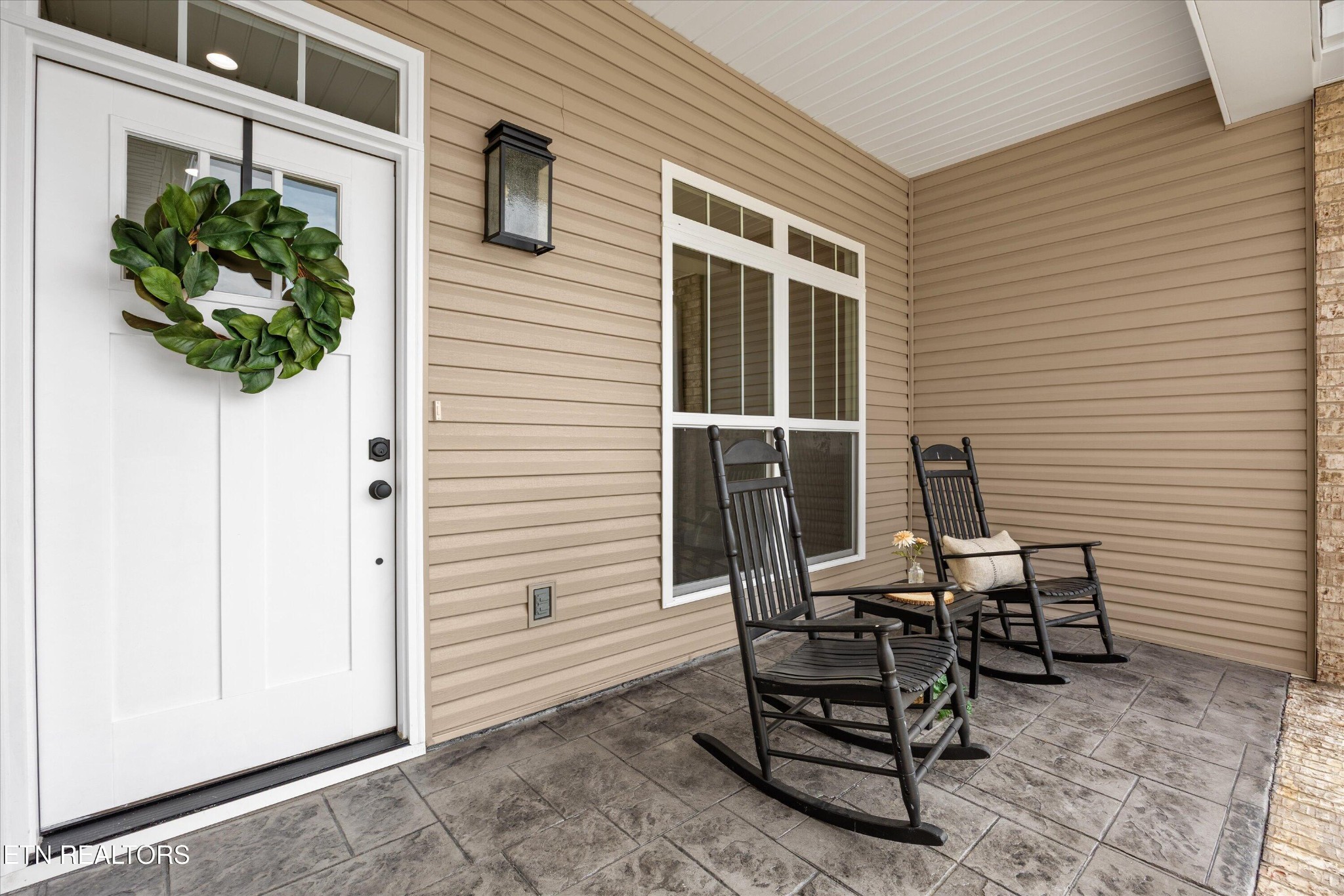 210 Daniel Morris Point Clinton, TN 37716 - Photo 2 of 45 a view of a dinning table and chairs in back of the house