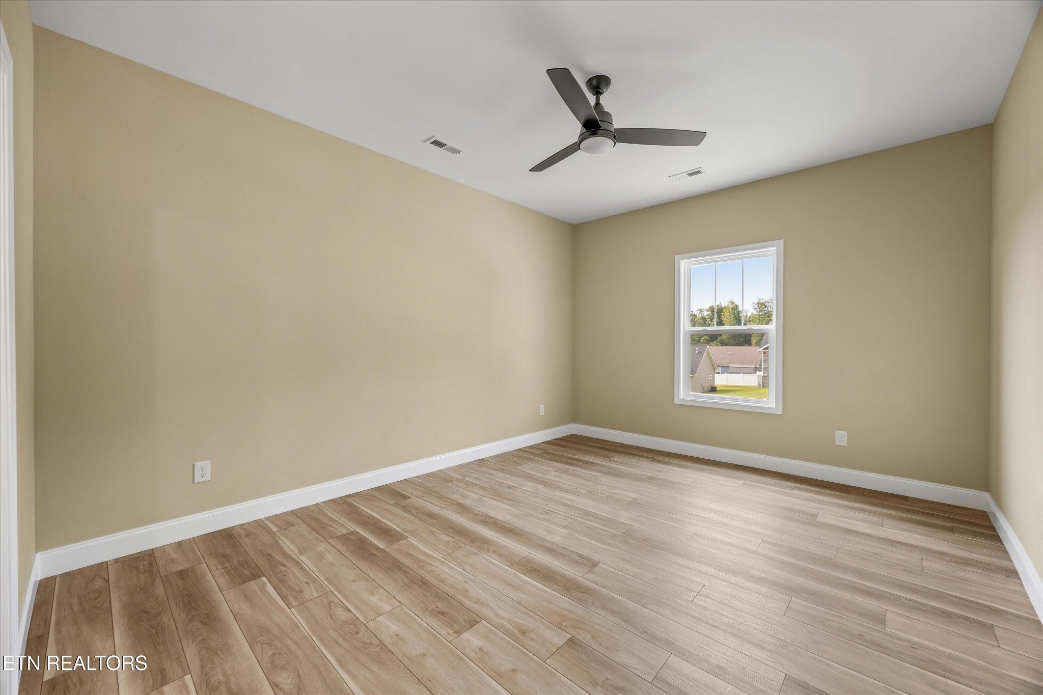210 Daniel Morris Point Clinton, TN 37716 - Photo 24 of 45 a view of empty room with wooden floor