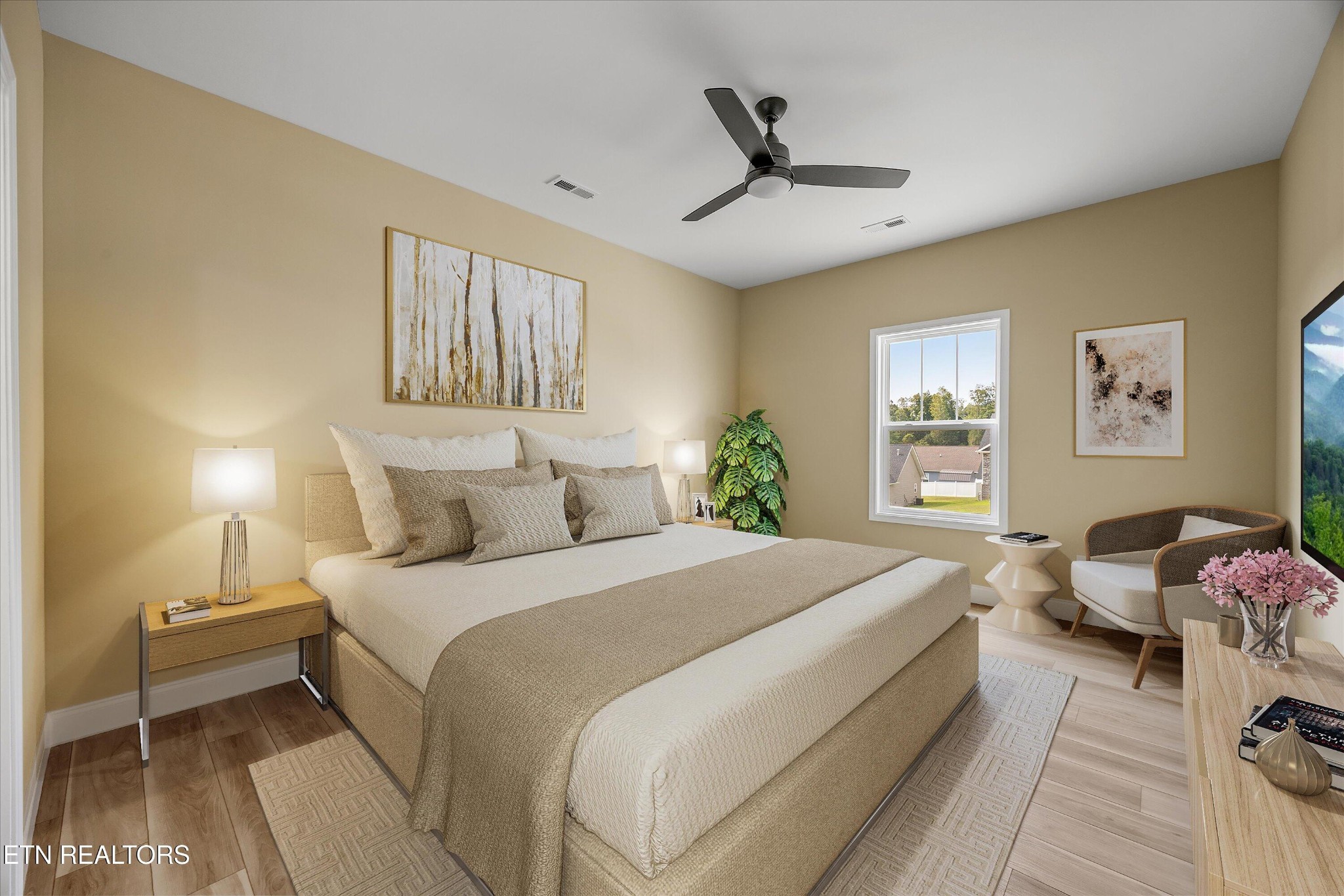 210 Daniel Morris Point Clinton, TN 37716 - Photo 25 of 45 a bedroom with a bed and wooden floor