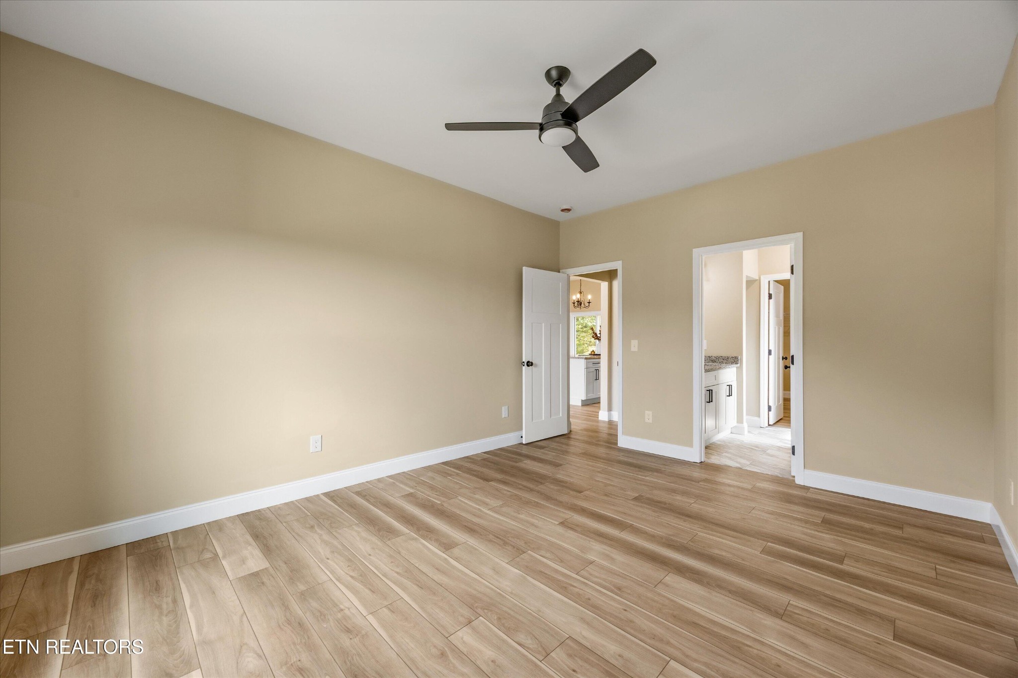 210 Daniel Morris Point Clinton, TN 37716 - Photo 26 of 45 a view of empty room with wooden floor