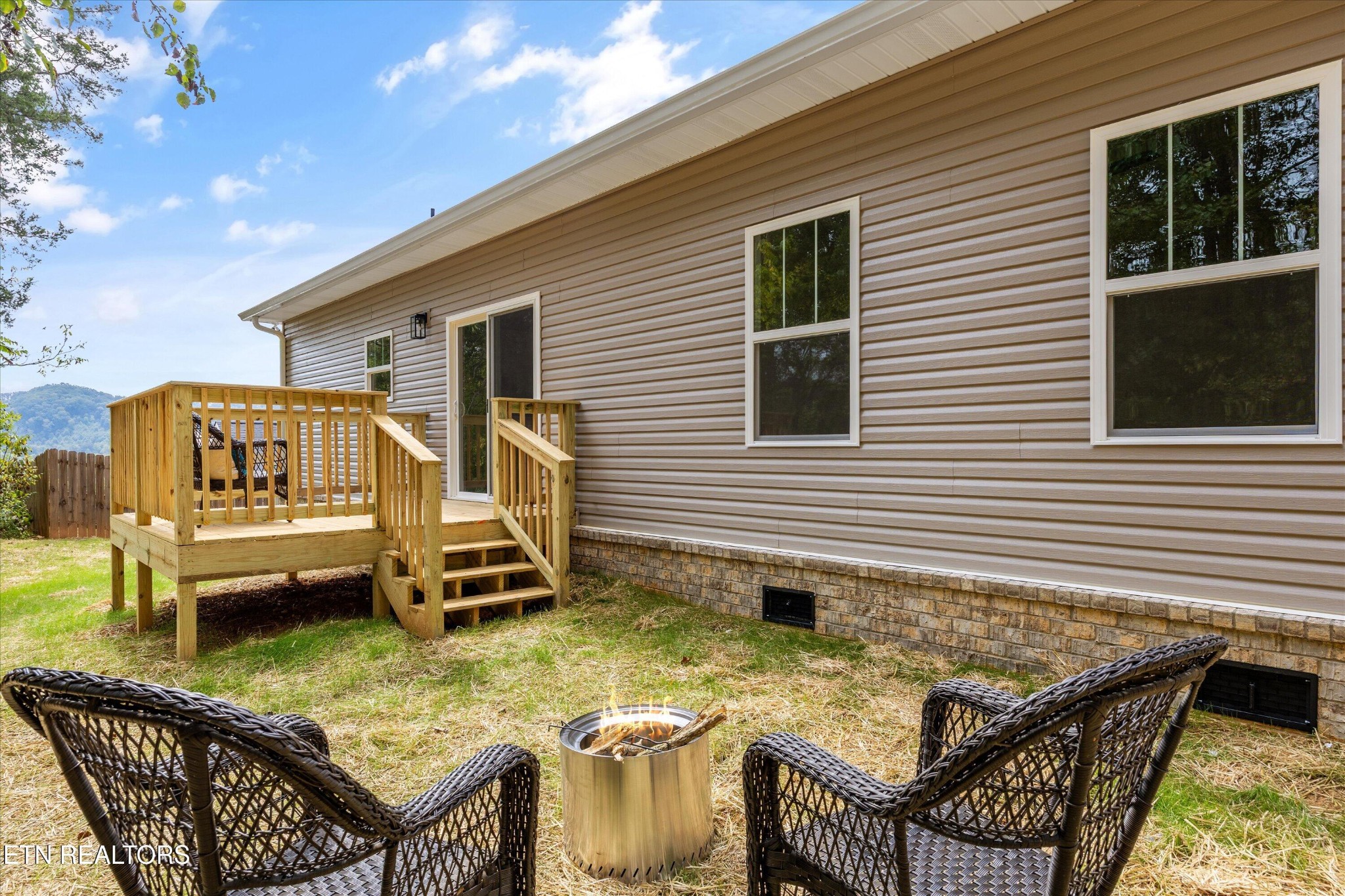 210 Daniel Morris Point Clinton, TN 37716 - Photo 33 of 45 a view of a house with pool and chairs