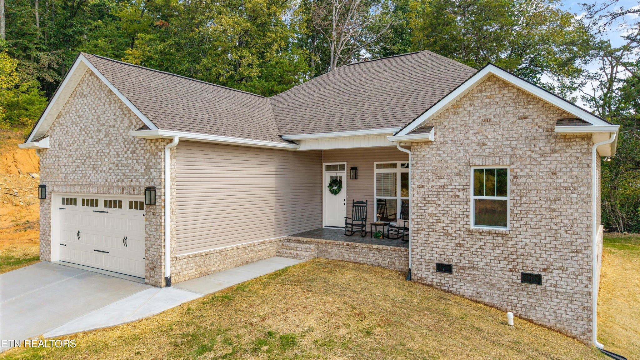 210 Daniel Morris Point Clinton, TN 37716 - Photo 43 of 45 a view of a house with a backyard