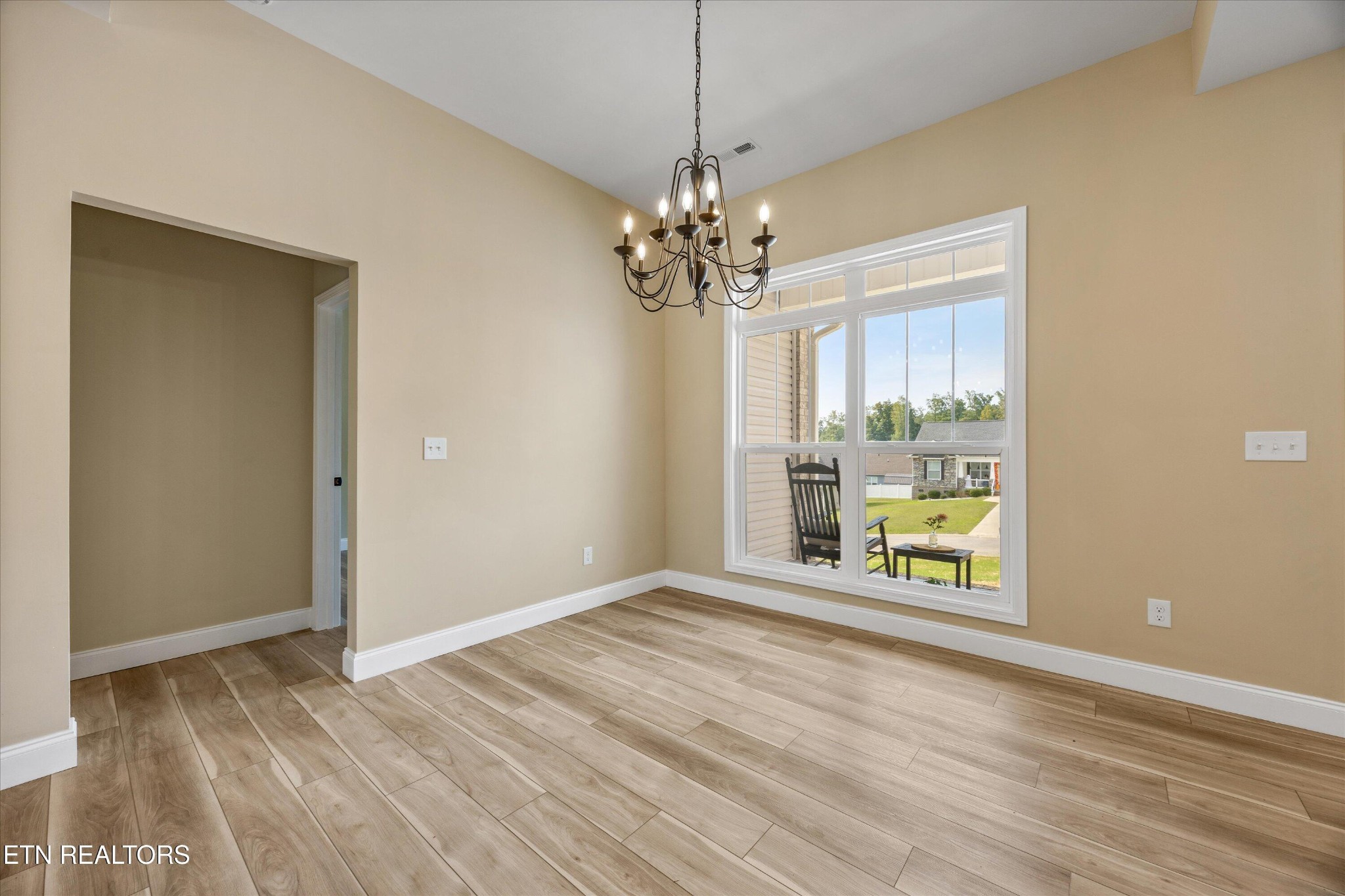 210 Daniel Morris Point Clinton, TN 37716 - Photo 6 of 45 a view of an empty room with a window