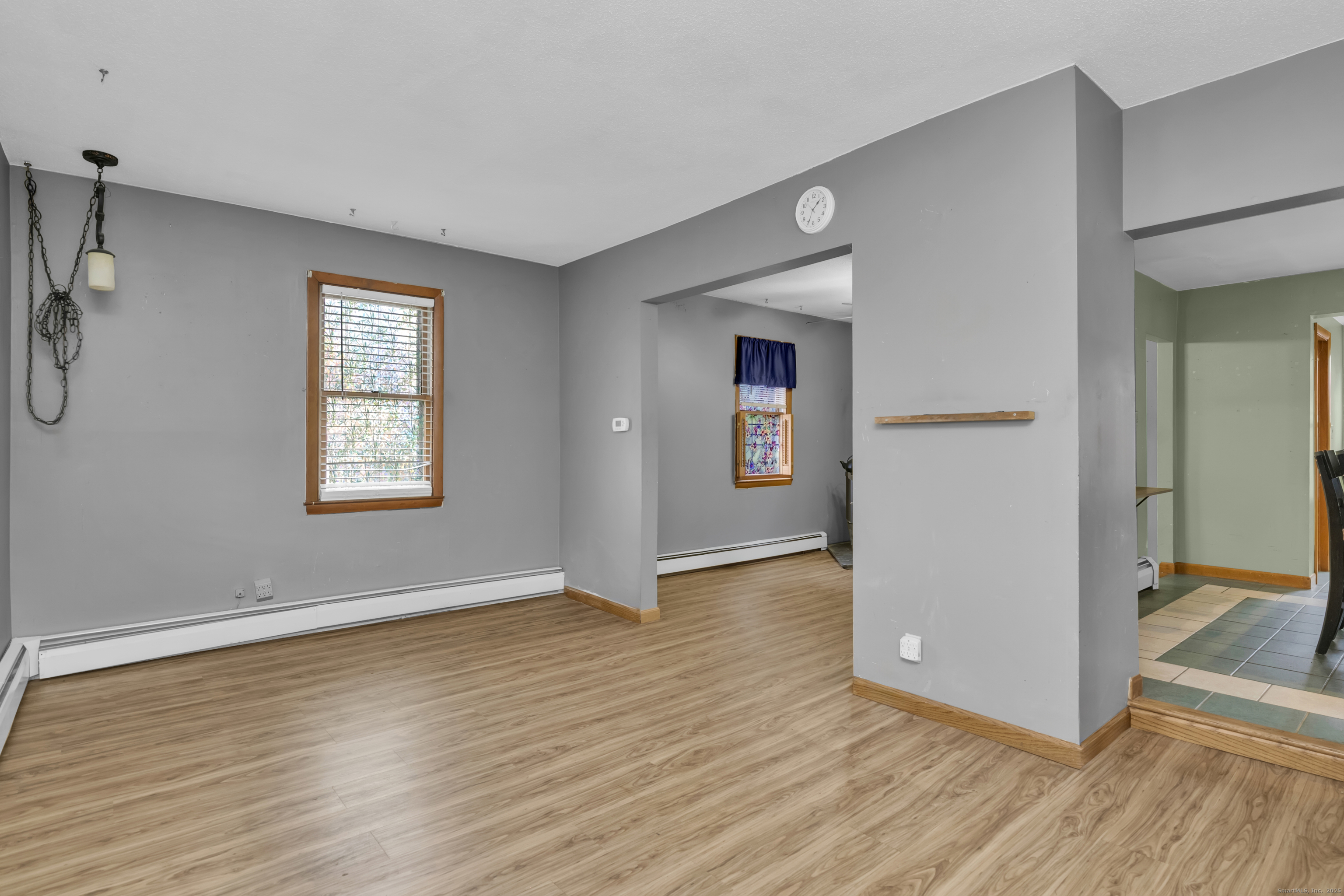 22 Lewis Street Naugatuck, CT 06770 - Photo 15 of 31 an empty room with wooden floor and windows