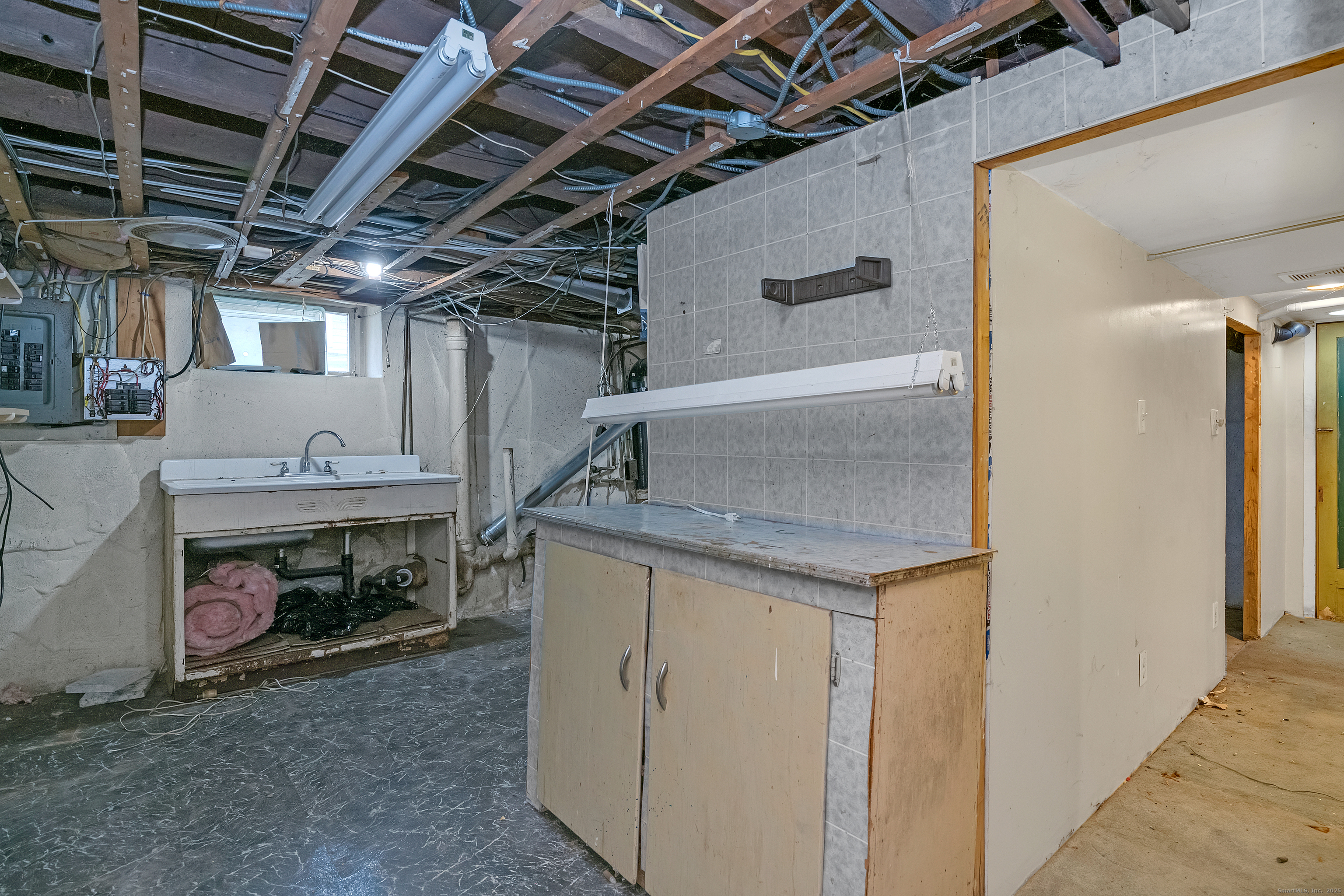 22 Lewis Street Naugatuck, CT 06770 - Photo 17 of 31 a utility room with dryer and washer