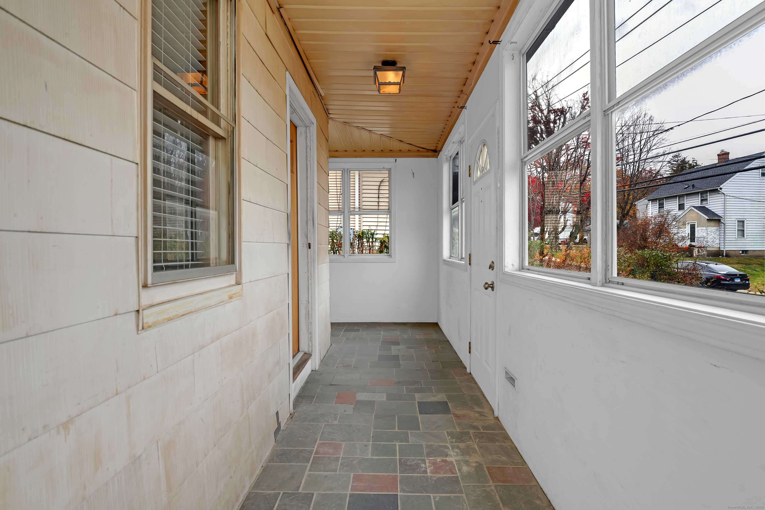 22 Lewis Street Naugatuck, CT 06770 - Photo 21 of 31 a view of a brick house with a large window
