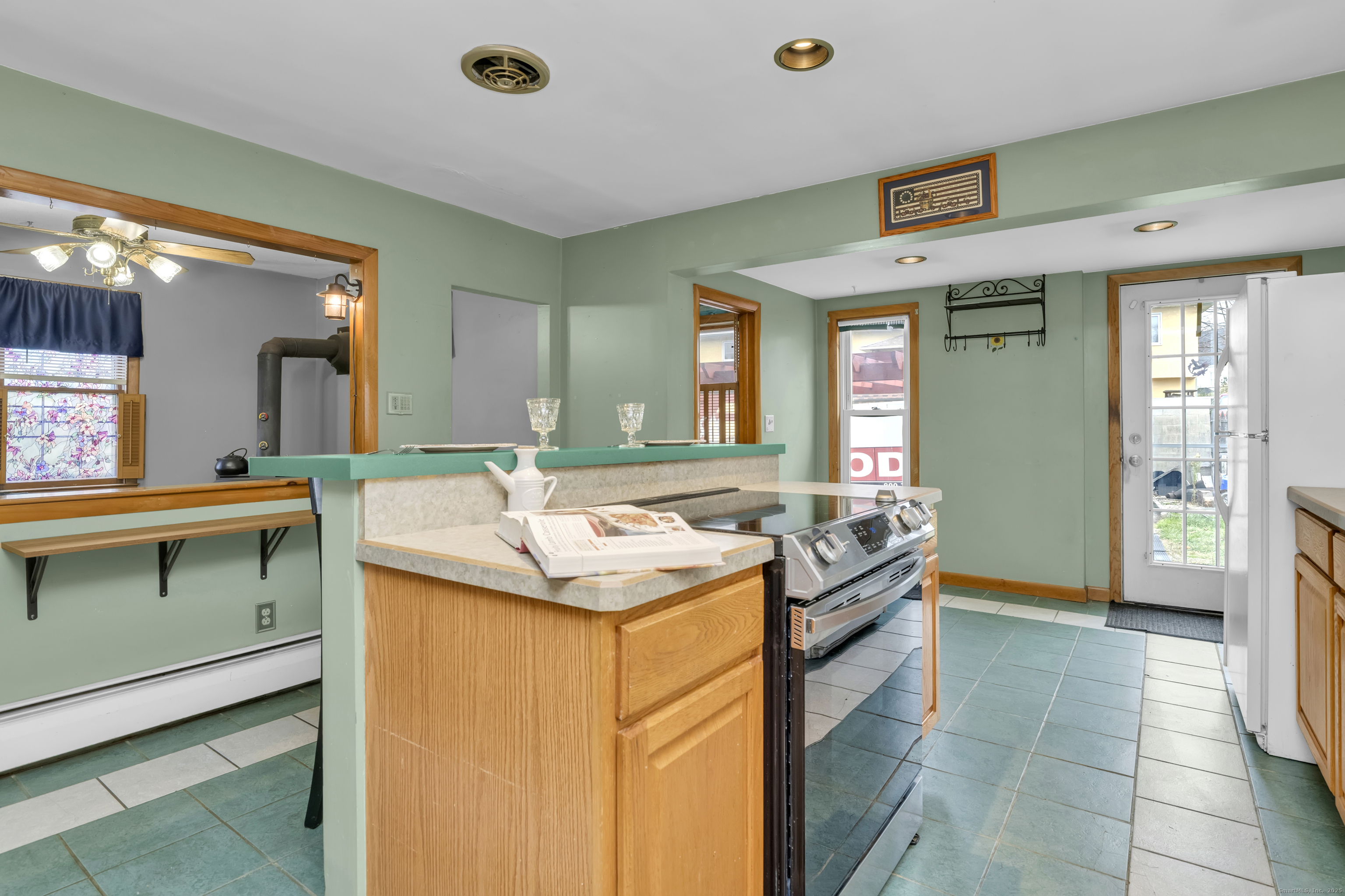 22 Lewis Street Naugatuck, CT 06770 - Photo 10 of 31 a room with a sink and a mirror