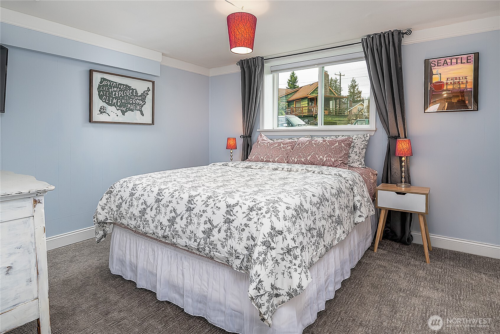 7638 Winona Avenue North, Unit B Seattle, WA 98103 - Photo 14 of 20 a bedroom with a bed and a window