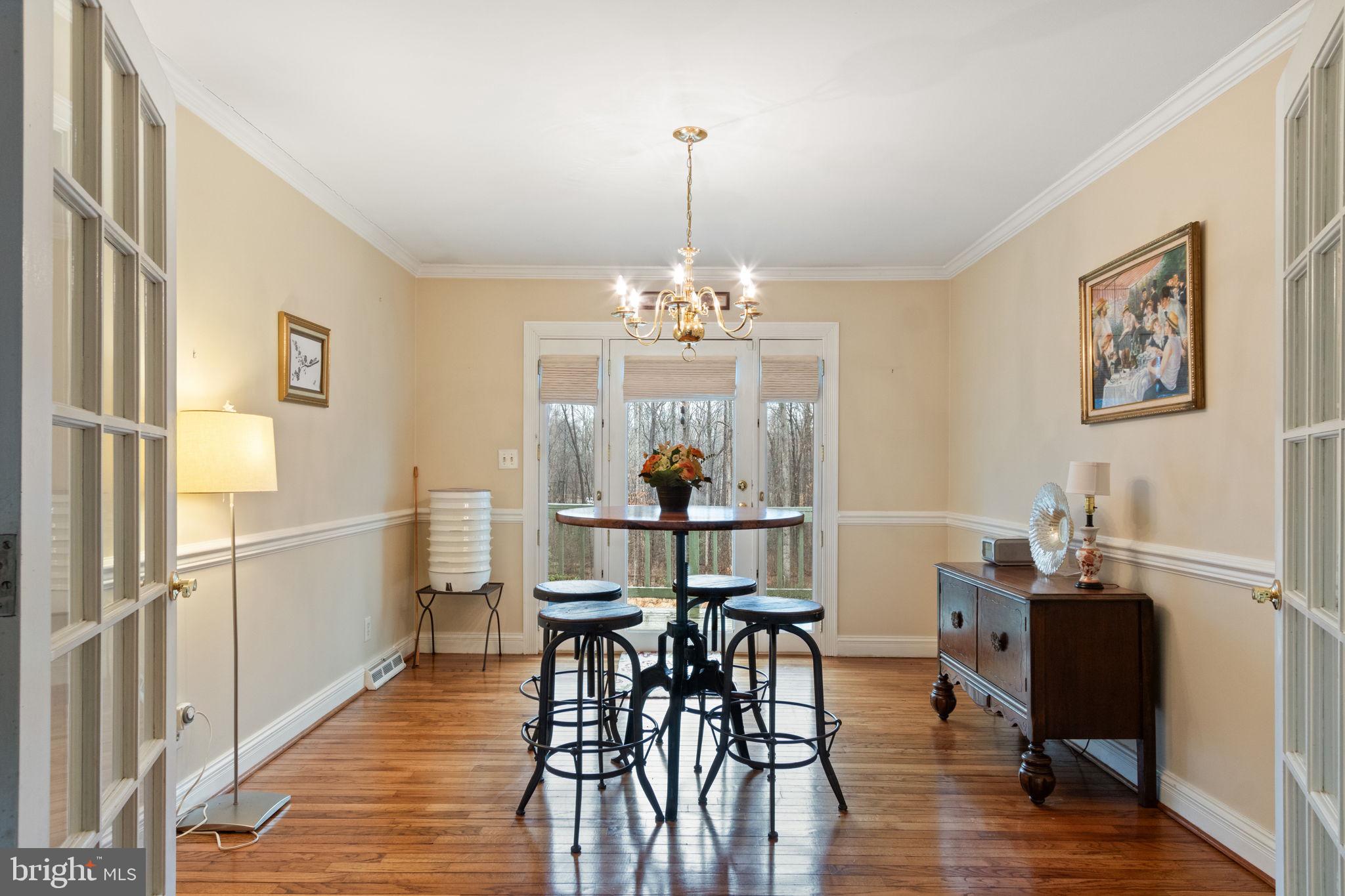 54 Richards Ferry Road Fredericksburg, VA 22406 - Photo 11 of 53 a view of a dining room with furniture window and wooden floor