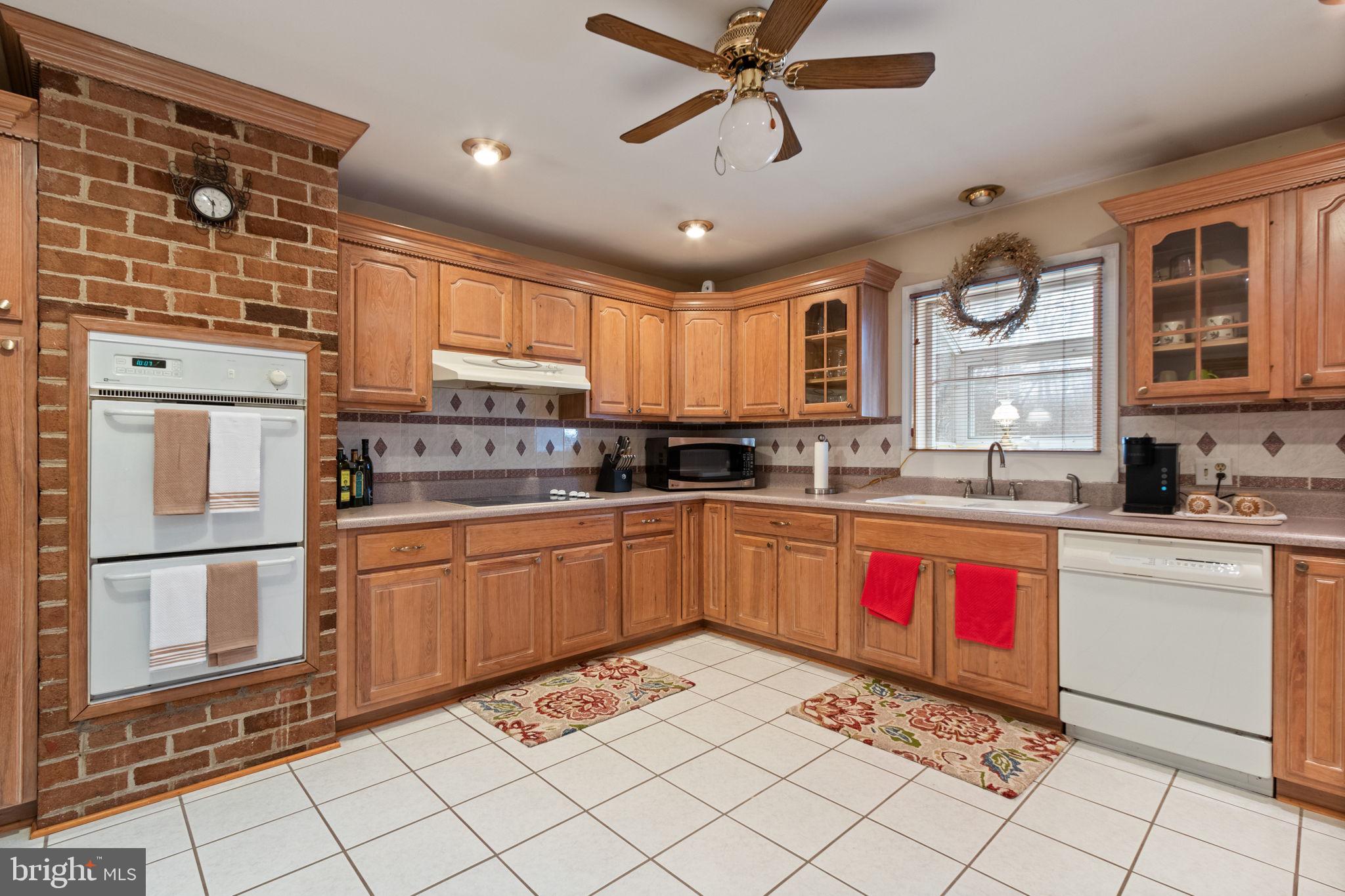 54 Richards Ferry Road Fredericksburg, VA 22406 - Photo 15 of 53 a kitchen with stainless steel appliances granite countertop a stove sink and cabinets