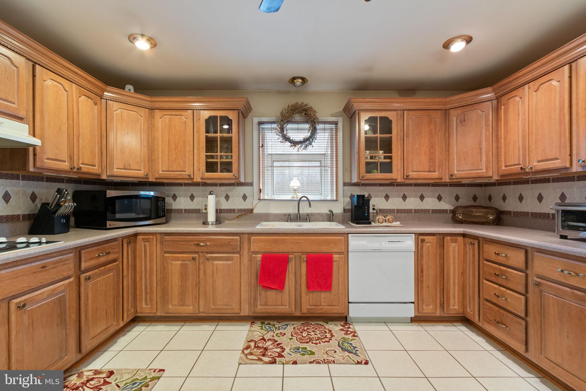 54 Richards Ferry Road Fredericksburg, VA 22406 - Photo 16 of 53 a large kitchen with stainless steel appliances granite countertop a stove sink and cabinets