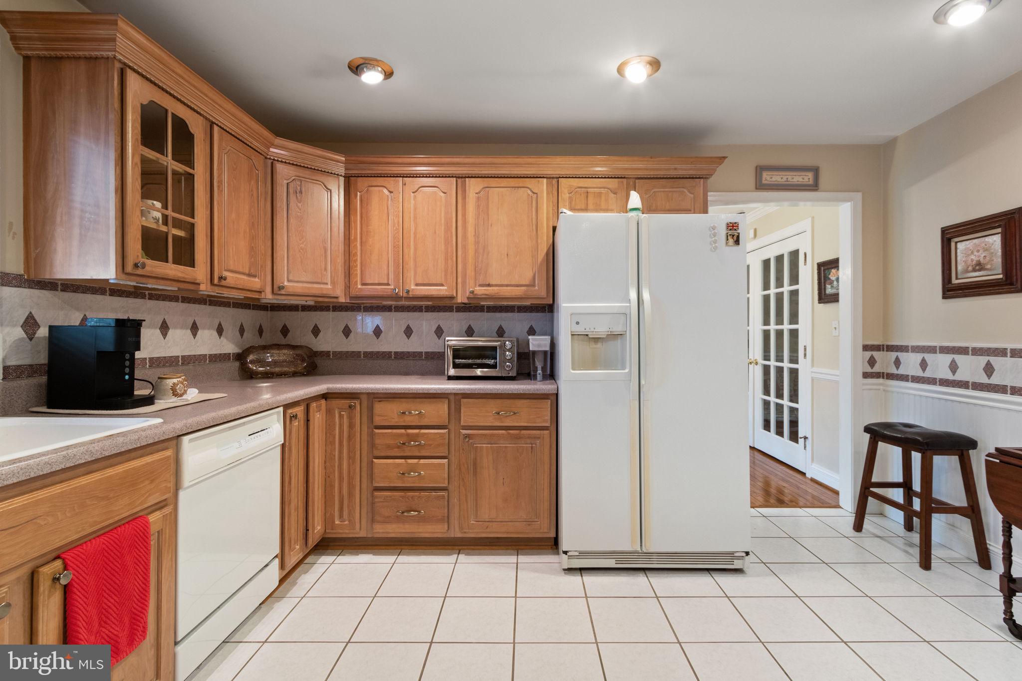 54 Richards Ferry Road Fredericksburg, VA 22406 - Photo 17 of 53 a kitchen with stainless steel appliances granite countertop a refrigerator sink and cabinets