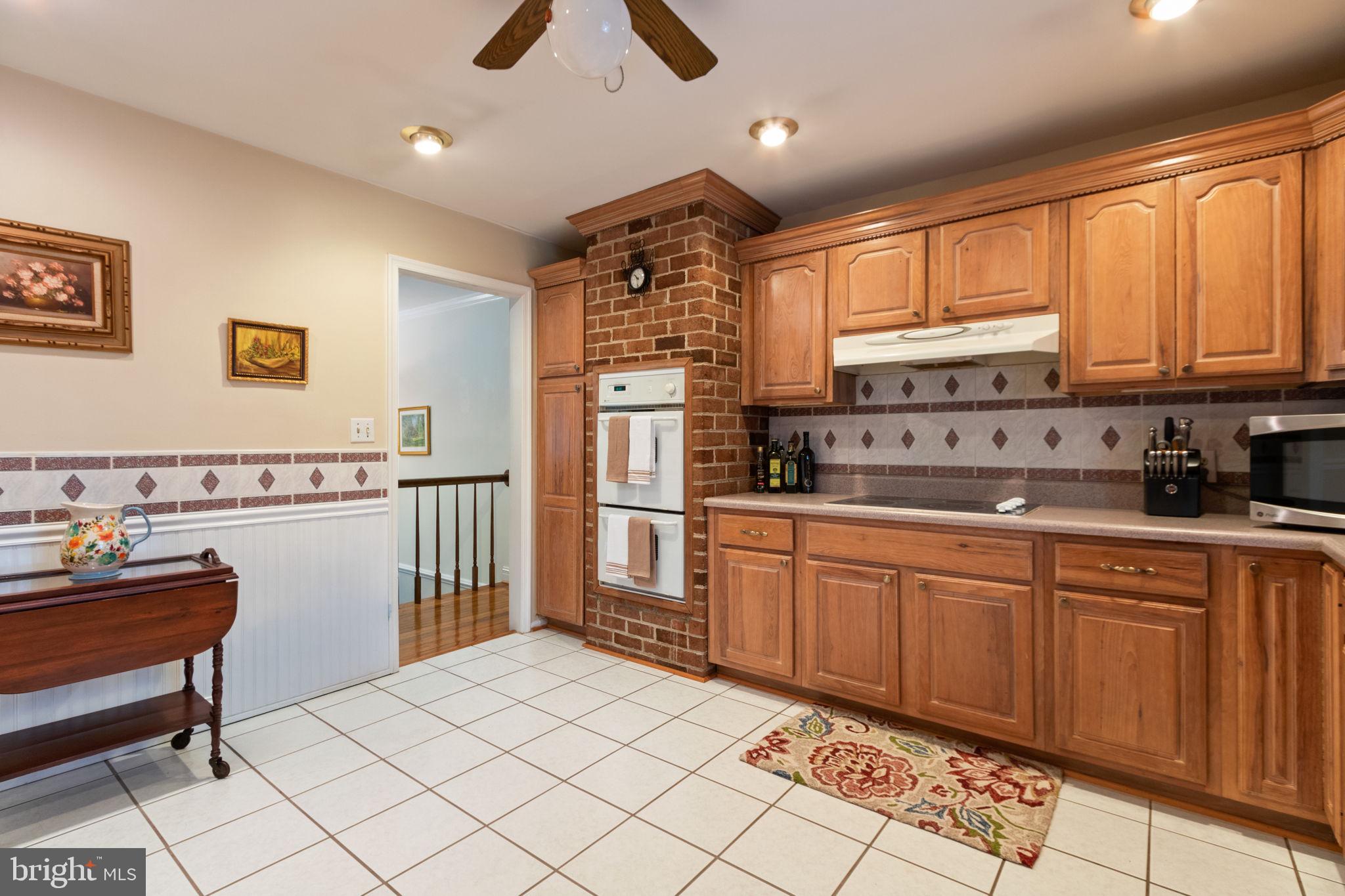 54 Richards Ferry Road Fredericksburg, VA 22406 - Photo 18 of 53 a kitchen with stainless steel appliances granite countertop a refrigerator and a stove top oven